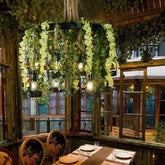 Lámpara de araña vintage de cuerda de cáñamo con 8 cabezas de flores en color morado/verde, perfecta para iluminación de restaurante con jaula de metal